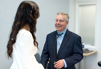 Dr. Lasin Consulting with Patient