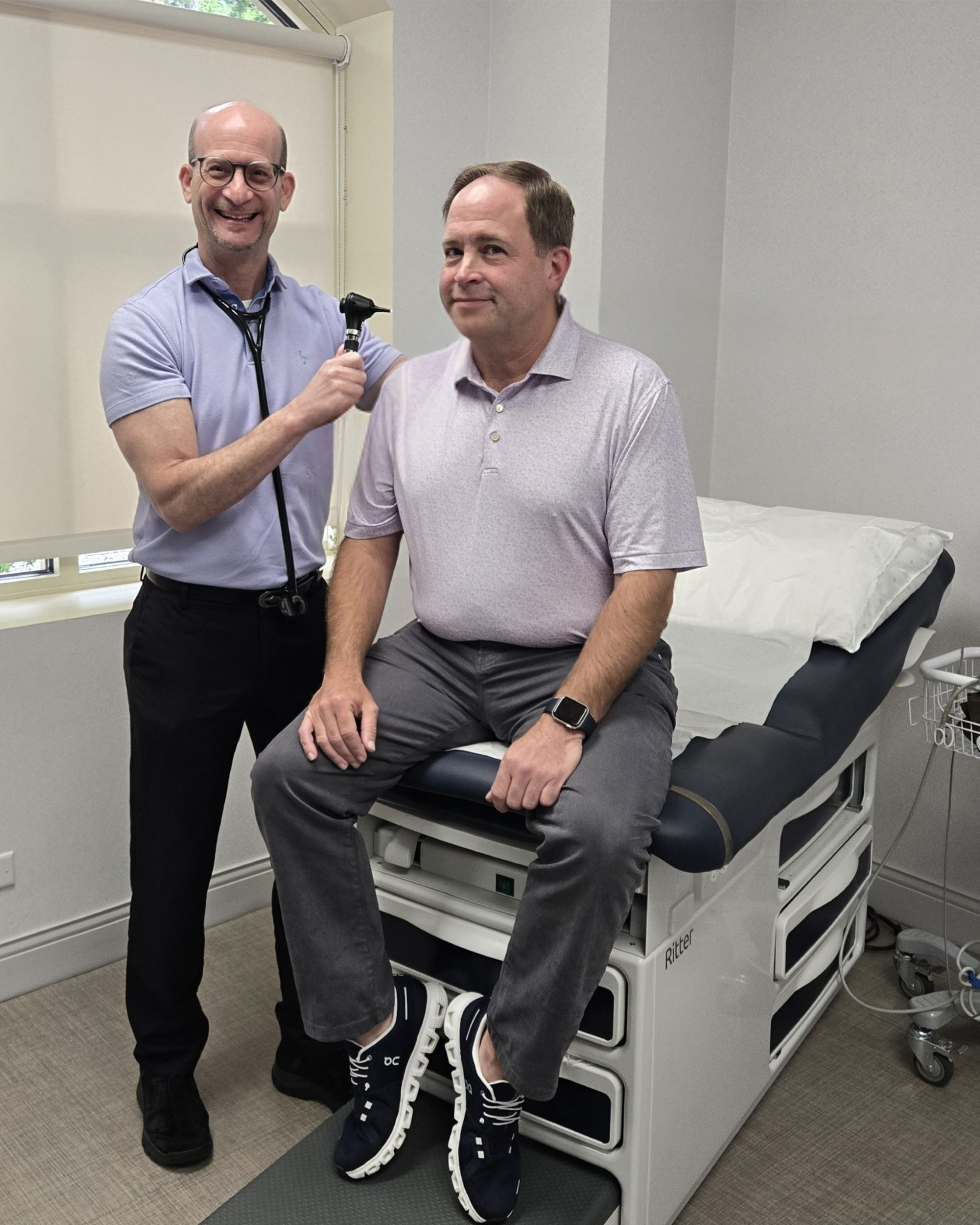 Dr. Wolfman with Patient