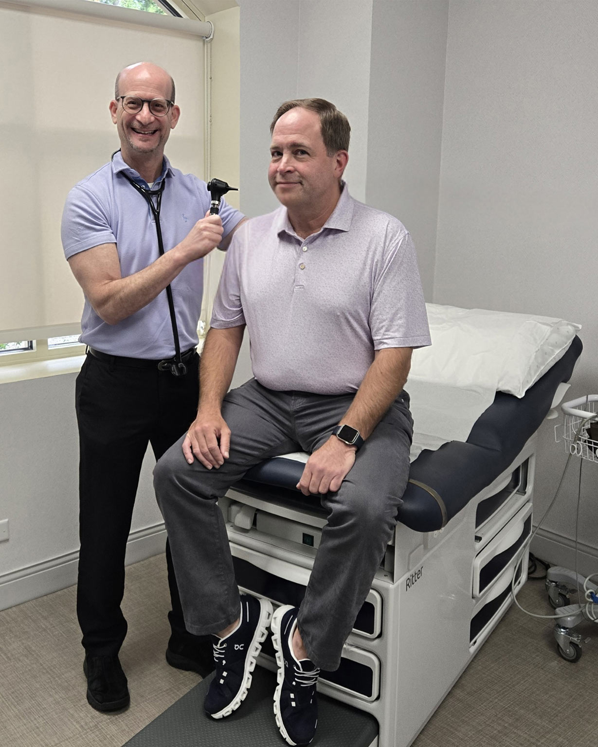 Dr. Wolfman with Patient